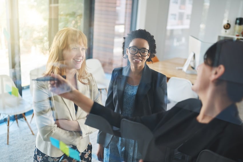 business-discussions-shot-of-businesswomen-brains-2022-10-07-20-23-46-utc