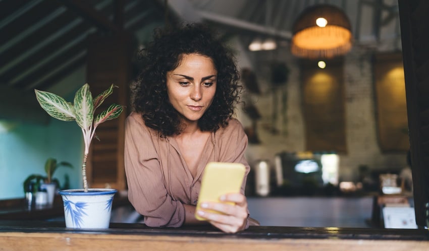 caucaisan-woman-reading-content-publication-while-2023-03-18-02-38-50-utc-1