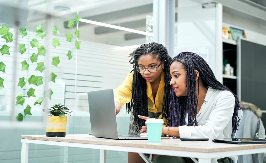 female-co-workers-in-the-office-discussing-marketi-2022-08-01-15-33-56-utc