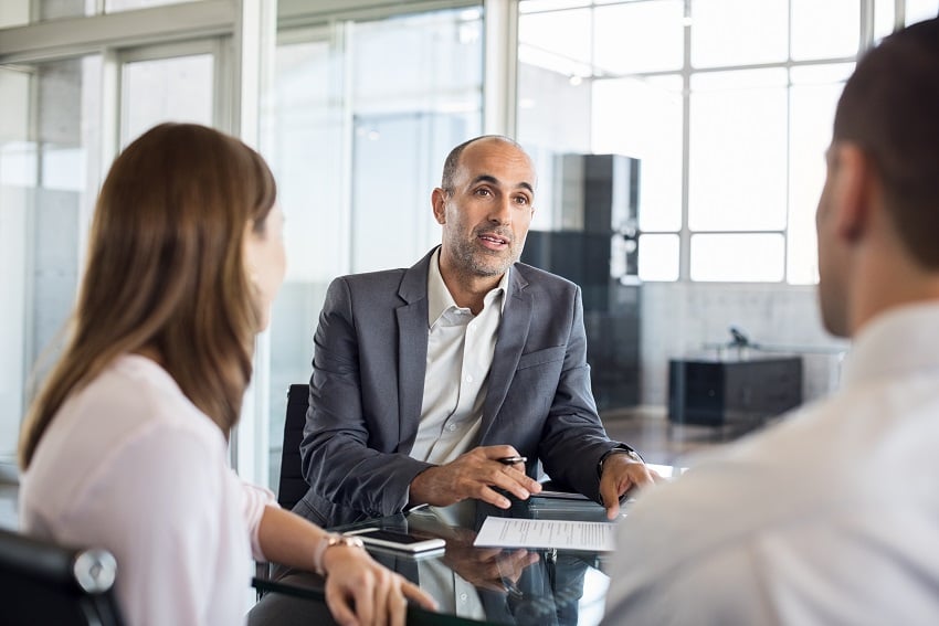 financial-advisor-with-clients-2021-08-26-15-34-40-utc