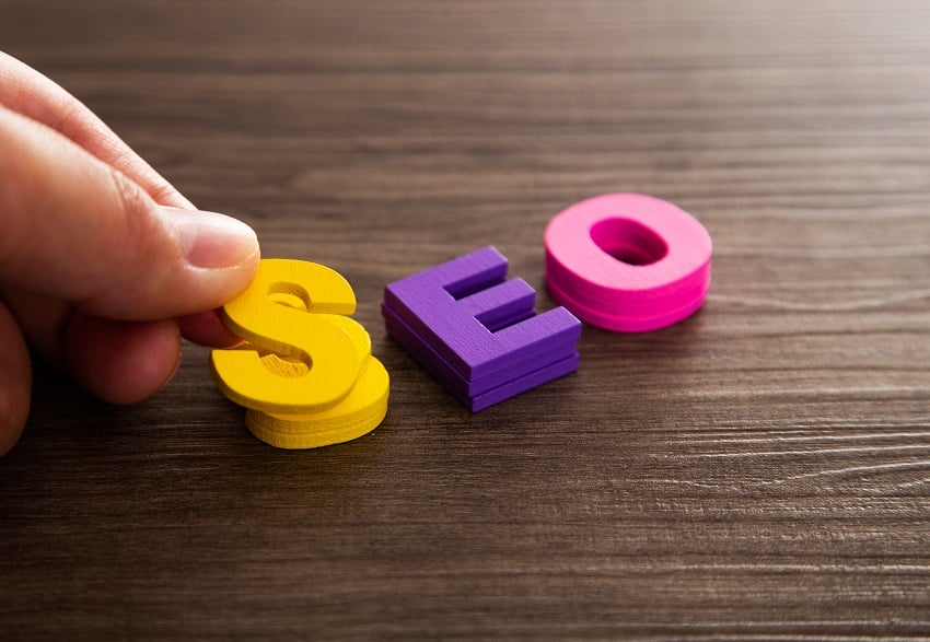 hand-arrange-wood-letters-as-seo-abbreviation-2023-03-27-19-42-47-utc