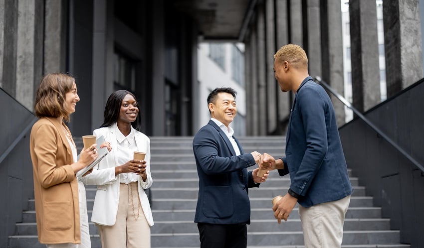 multiracial-business-team-bumping-fists-each-other-2021-12-09-02-43-13-utc