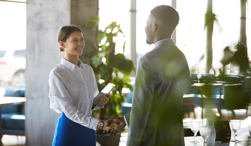 pretty-business-lady-shaking-hand-of-business-part-2022-10-07-01-03-42-utc