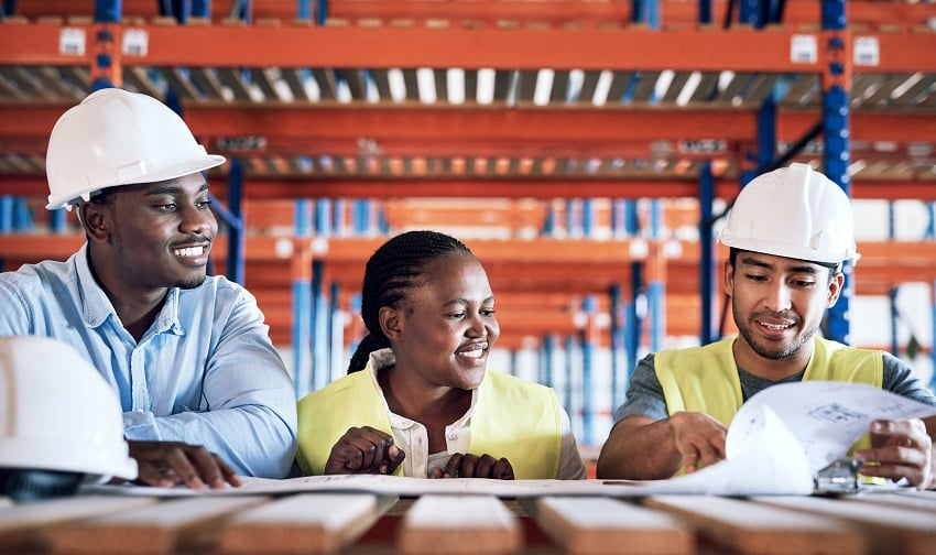 shot-of-a-group-of-builders-having-a-meeting-at-a-2022-09-14-00-34-20-utc