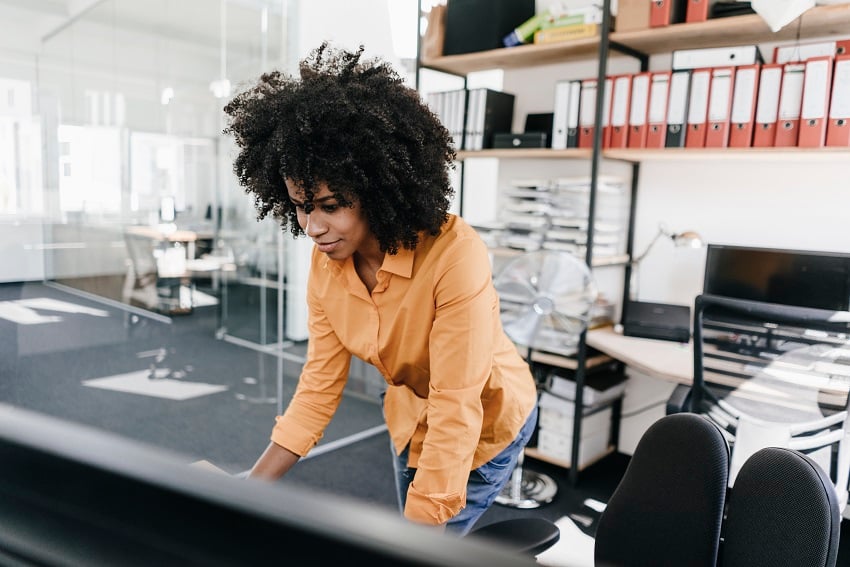 young-woman-working-in-office-2022-12-16-22-30-37-utc
